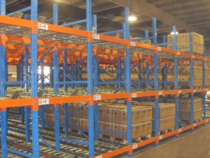 Pallet flow rack storage systems