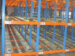 Pallet flow rack storage systems